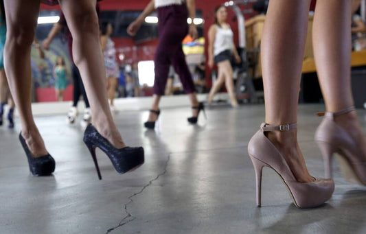 Which country uses the high heels more?